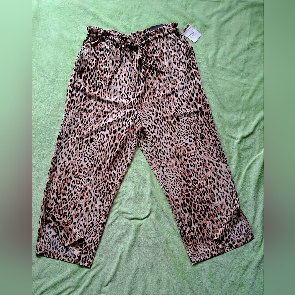 Animal print pants, size large,tan brown print